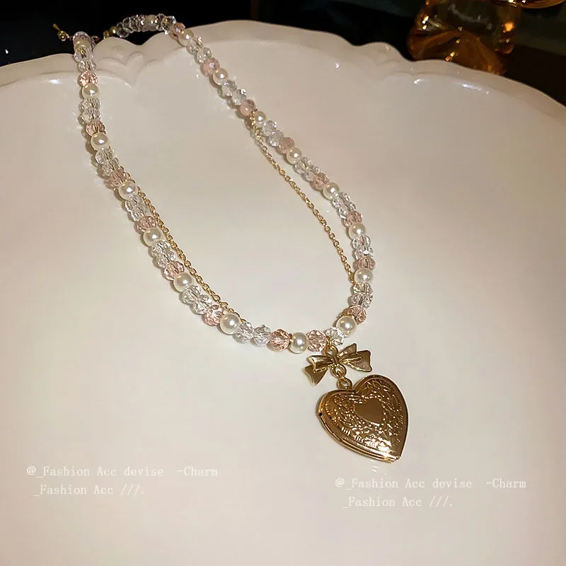 Crystal Pearl Bow Necklace for women French Romantic Love Pendant Clavicle Chain Wholesale fashion and sweet temperament jewelry