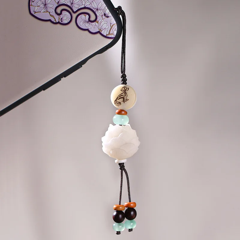 

Chinese style white bodhi root carving lotus mobile phone pendant pendant back cloud bag pendant couple mobile phone chain
