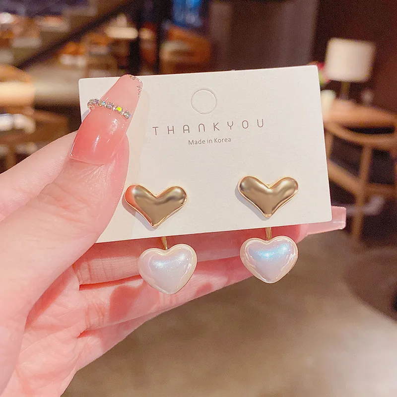 

New simple fashion pearl love pendant S925 silver needle earrings female temperament exquisite earrings