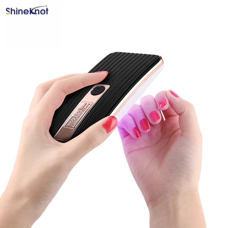 Фото SHINEKNOT 36W Мини-лампа для ногтей, портативная, с питанием от USB, многофункциональная УФ-лампа, ручная светодиодная лампа для маникюра, складная подставка, легкость переноски №3