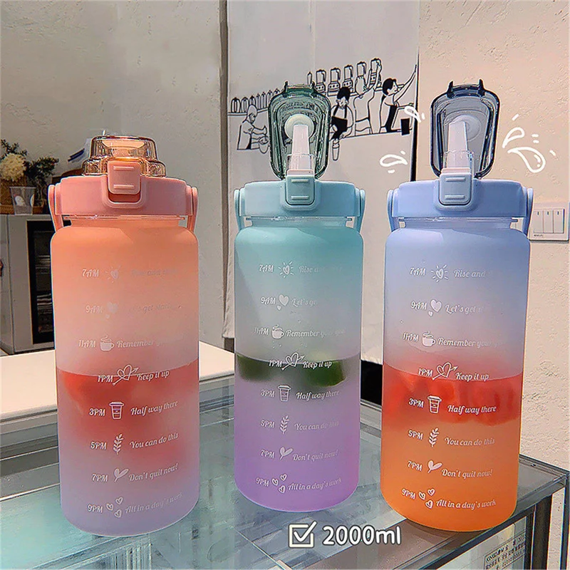 

2L Large Capacity Water Bottle Straw Cup High Temperature Plastic Water Cup Time Scale Frosted Outdoor Sports Student Couple Cup