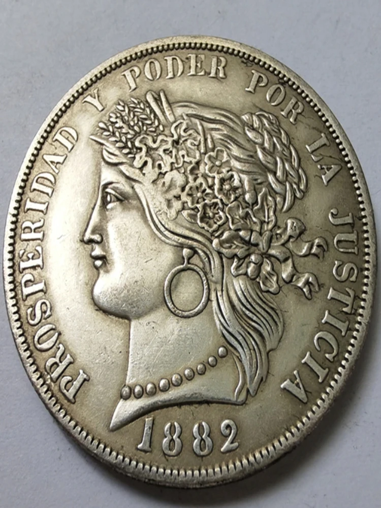 

Посеребренная монета Перу 5 Песет 1880-1882 годов