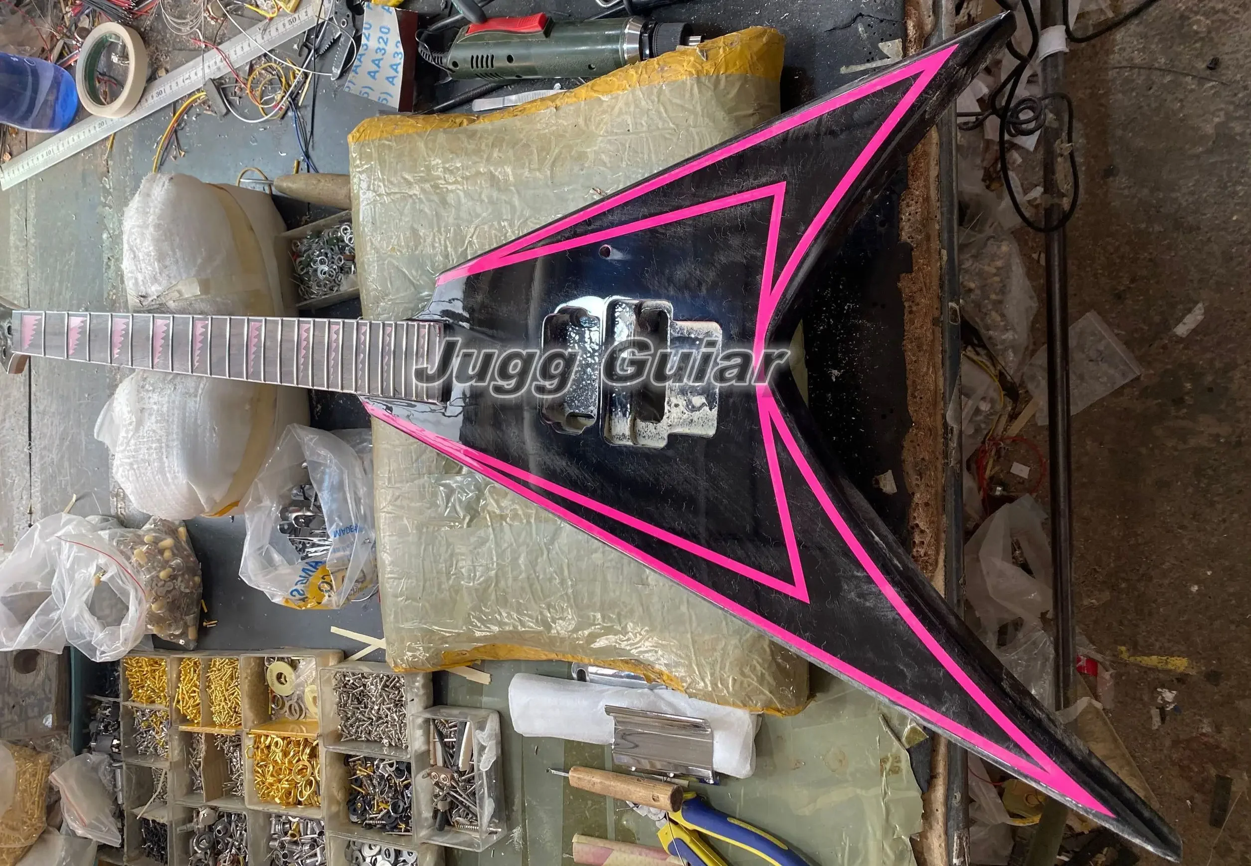 

Alexi Laiho Singature Pink Sawtooth V Electric Guitar Floyd Rose Tremolo Bridge, China Active EMG Pickups, 9V Battery Box