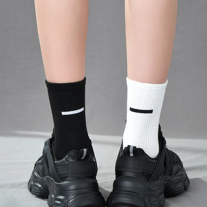 Однотонные мужские и женские носки Kuuk черно-белые на весну осень простые