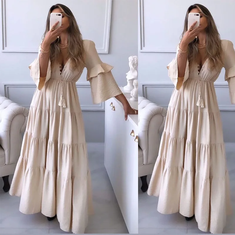 

2022 spring and summer new women's V-neck irregular lotus leaf dress solid color long skirt