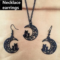 black cutout moon earring necklace cat crescent black filigree witch earring necklace gothic jewelry