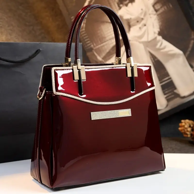

New Women's Large Bag Single Shoulder Oblique Straddle Handbag Fashion Lacquer Leather Atmosphere Simple Middle aged Women's Bag