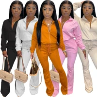 european and american womens sexy streetwear solid color zipper elastic flared pants casual two piece set