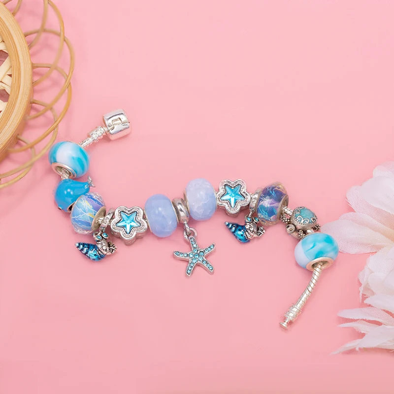 Цепочка с подвесками в виде краба черепахи и Кита