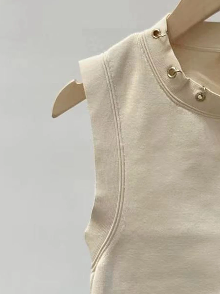 

2022 Autumn New Sleeveless Solid Color Metal Ring Short Knitted Sweater Beige White Women Vest + Skirt Suit