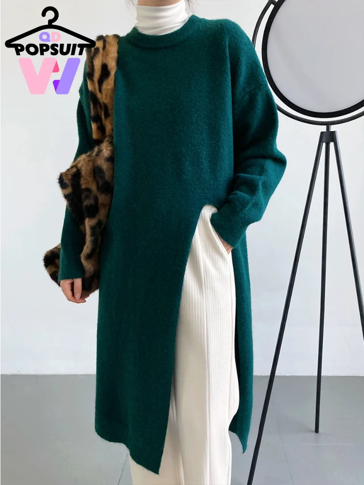 

Женское вязаное платье-свитер средней длины, с круглым вырезом