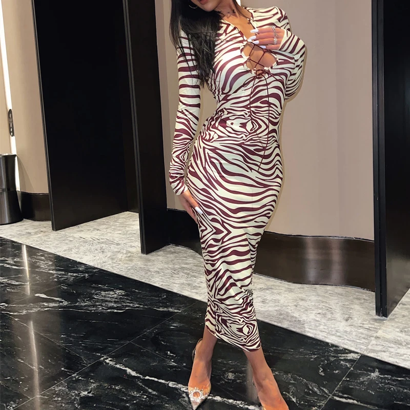 

2022 Spring And Summer New Fashion Sexy Printed Striped Pattern Chest Hollow Long Sleeved Slim Dress Women