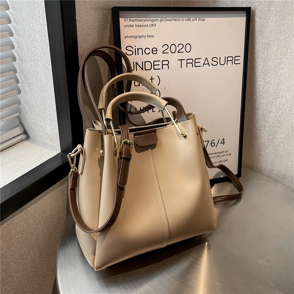 

Маленькая женская сумочка-ведро с металлическими ручками, осень 2023, трендовые модные дизайнерские дамские сумки через плечо для работы