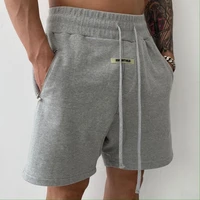 double line korean version of the new sports fitness hanging crotch shorts mens trend loose five point pants mens