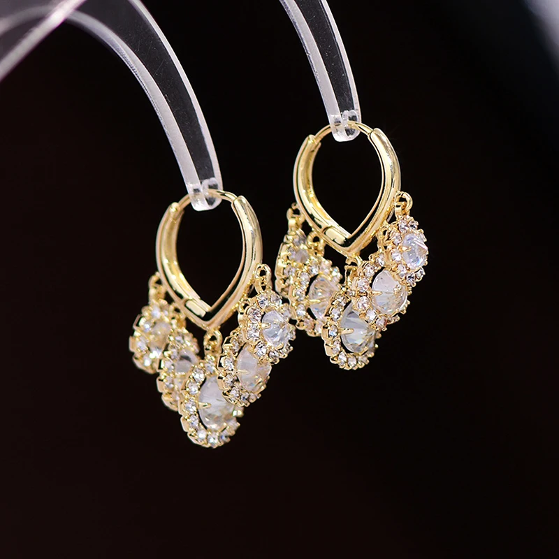 

Серьги-подвески с кисточками и цветком из циркония, 14 к