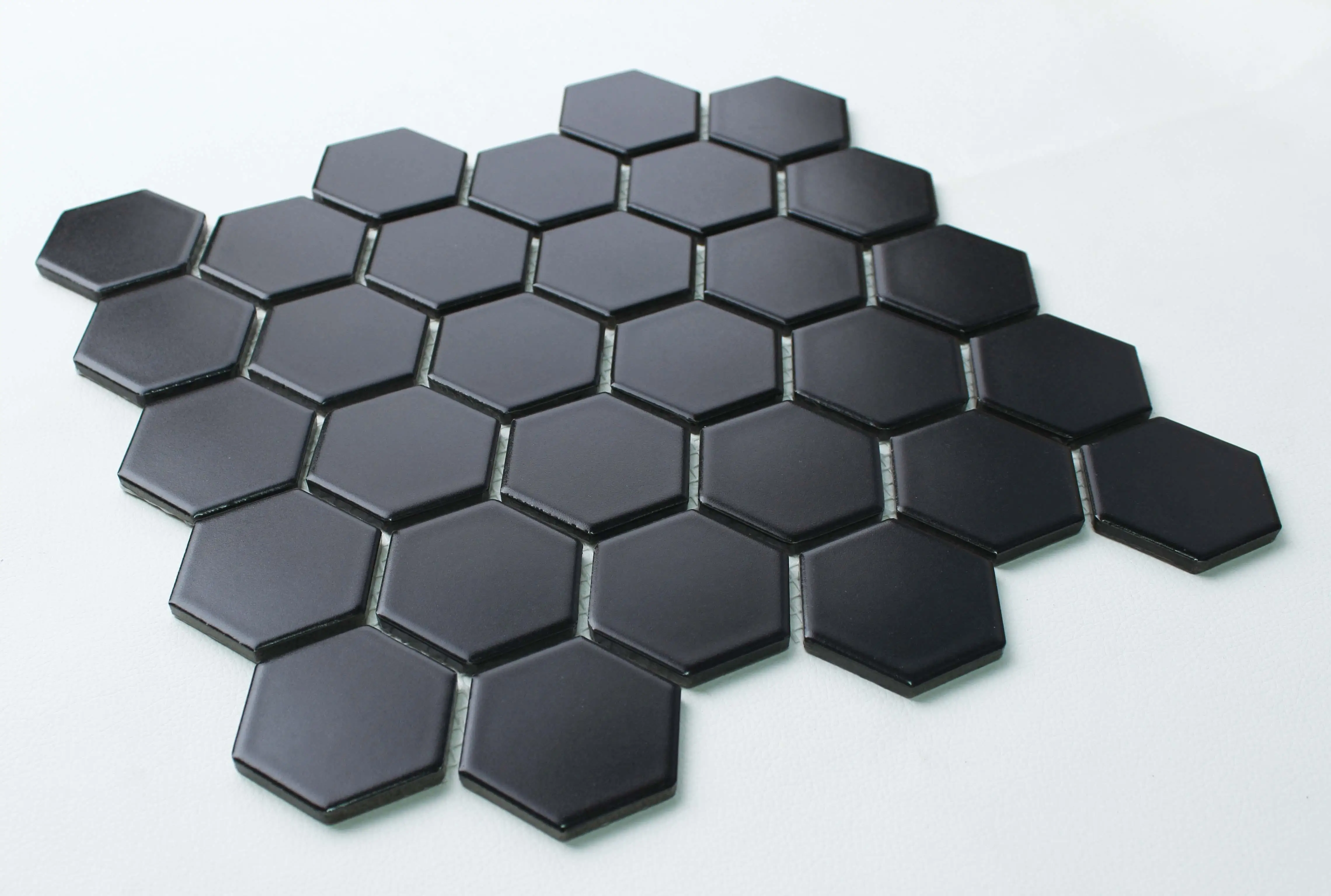 

WS Tiles - Value Matte Black 10.5 in. x 10.5 in. Porcelain 2" Hexagon Mosaic Floor & Wall Tile (9 sq. ft / Case)