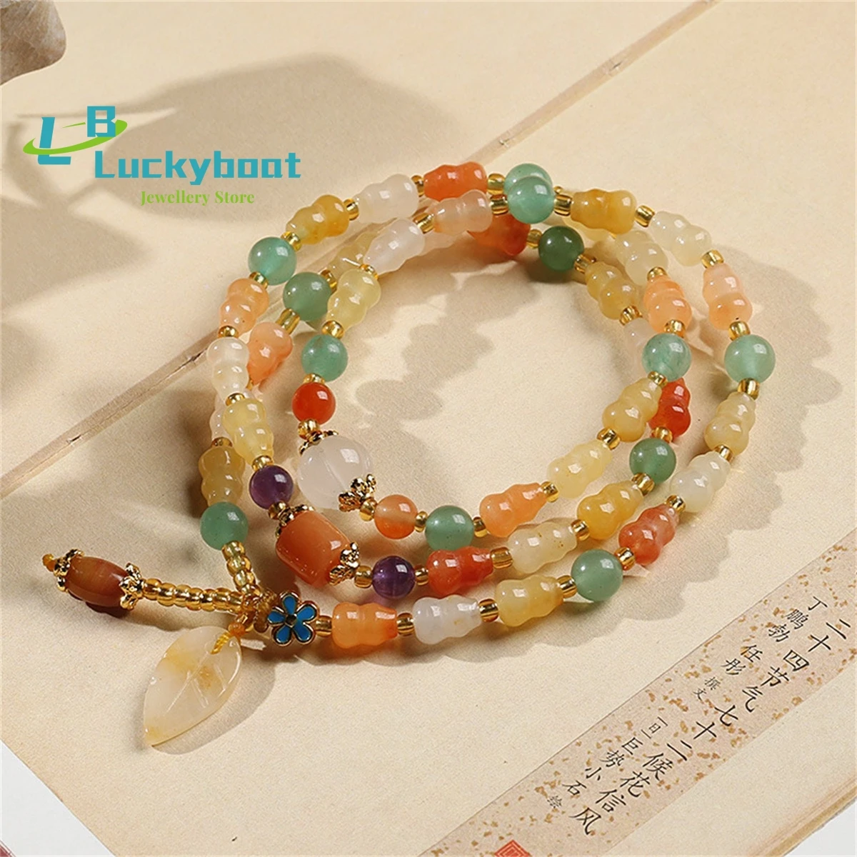 

Ethnic Style Natural Gold Silk Jade Hand Chain Xinjiang Colorful Women's Three Ring Gourd Hanging Leaf Bracelet Charm Jewelry