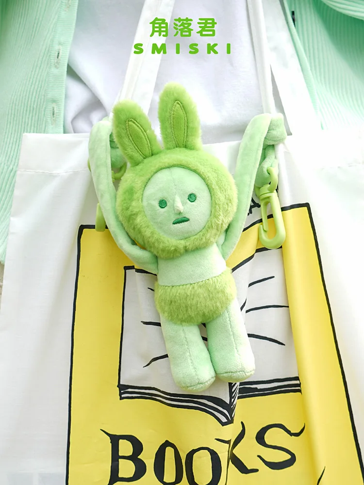 

Кукла в виде рюкзака с подвеской в виде автомобиля