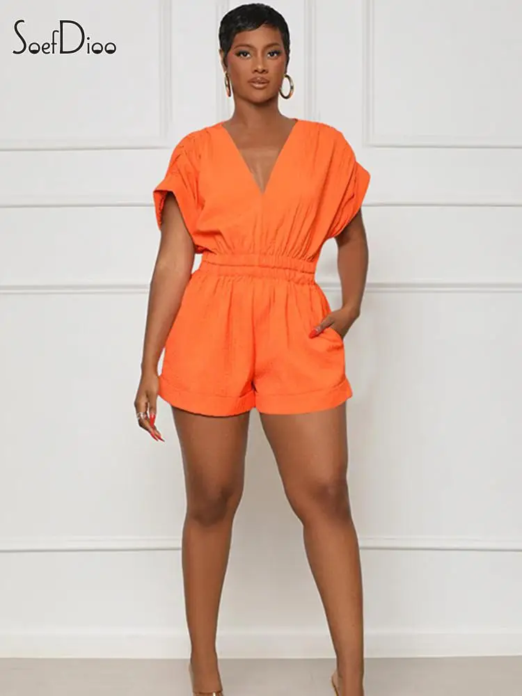 

Женский комбинезон с коротким рукавом «летучая мышь» и V-образным вырезом