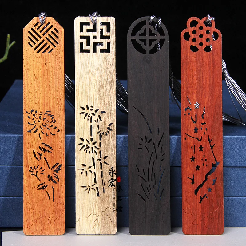 

Rosewood bookmark hollow four-color plum, orchid, bamboo and chrysanthemum bookmark landscape flowers ebony bookmark