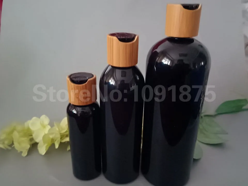 

10pcs 100ml 150ml 200ml 250ml 300ml 500ml black plastic lotion shampoo bottle with black bamboo disc top cap shower gel bottle