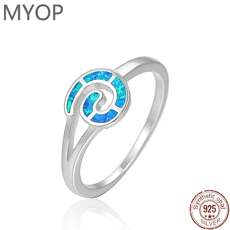 

Женское кольцо из серебра 925 пробы с синтетическим опалом