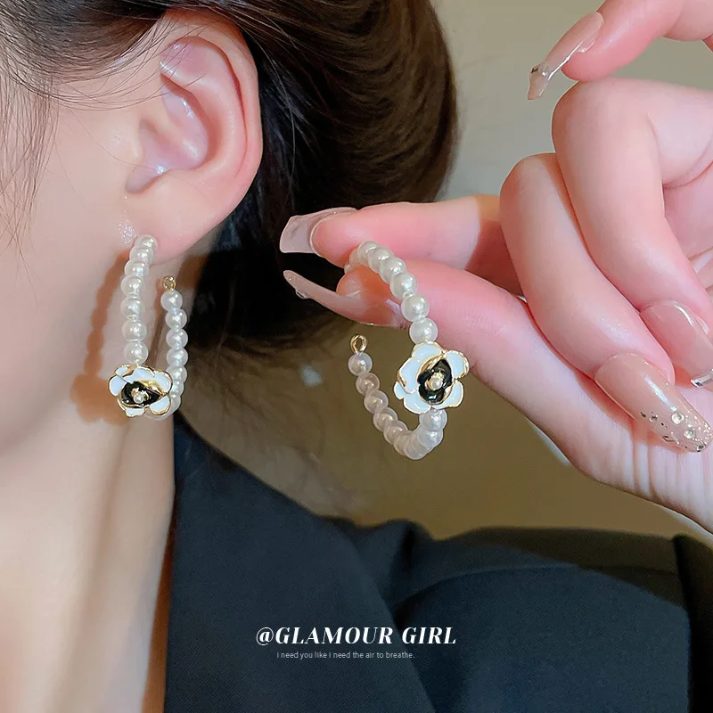 

French pearl flower geometric ear ring earrings temperament senior sense net red pendant every match ear ornaments Free shipping