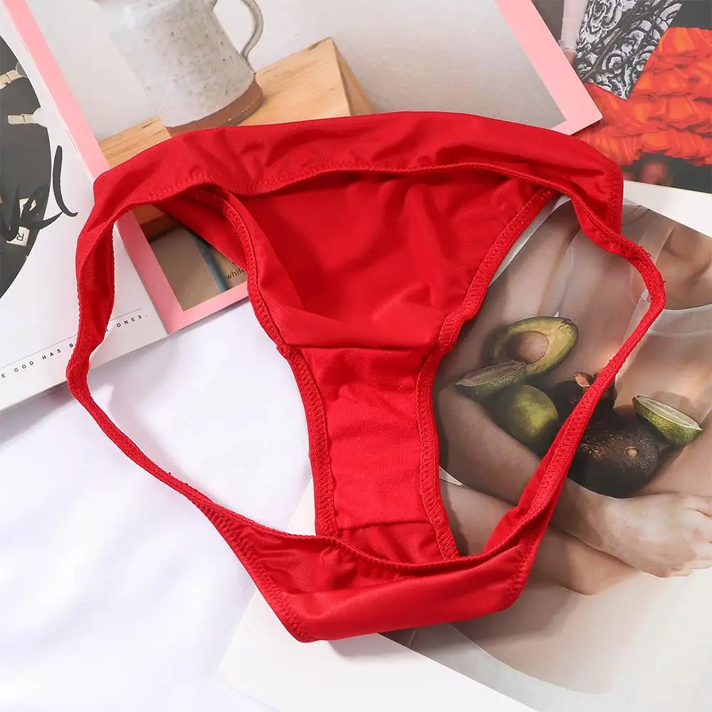 

Sexy Low Waist Men Women Half-covered Buttocks Solid Color Triangle Thong Ladies Panties Milk Silk