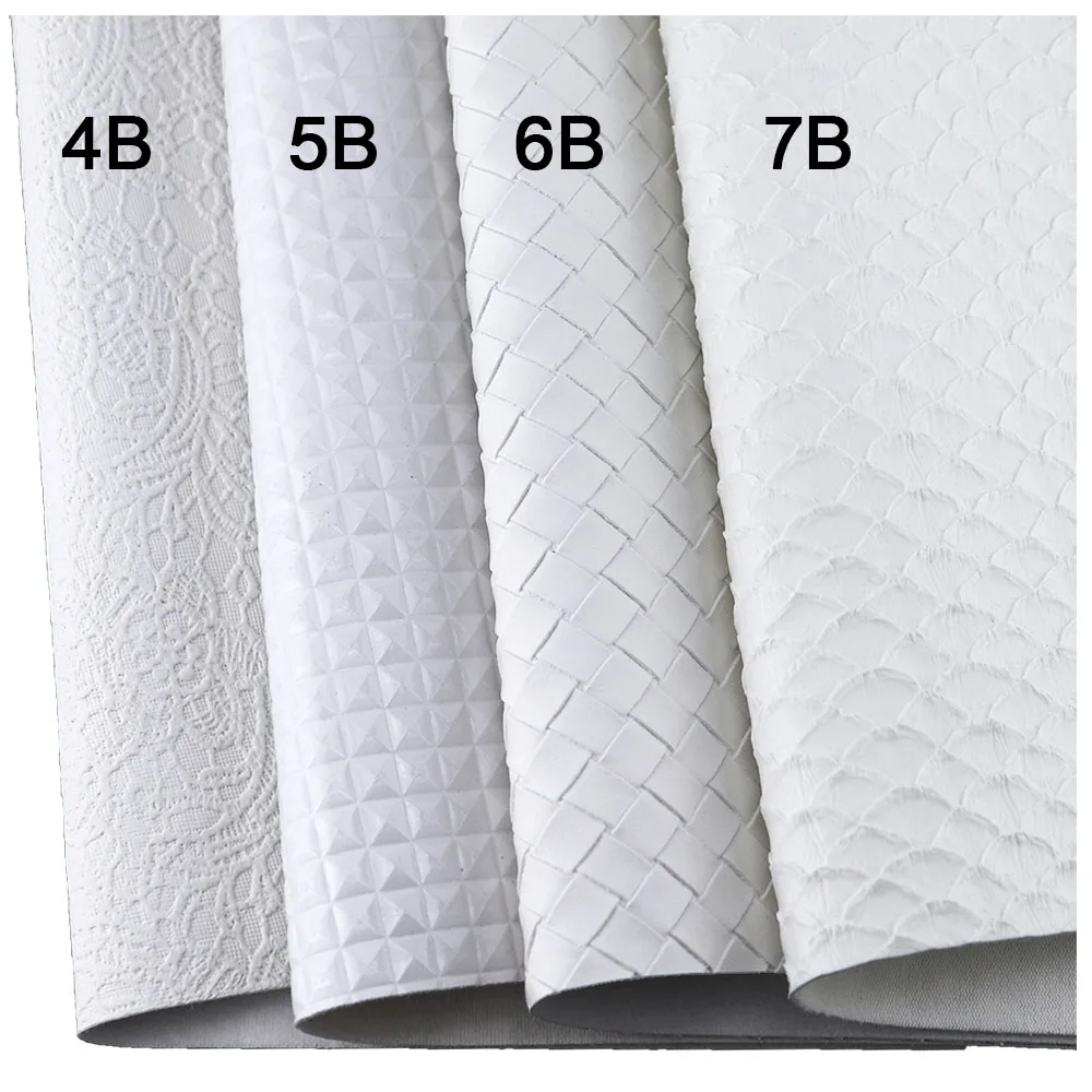 Черно-белая однотонная гладкая текстура личи чешуя тисненая ткань из