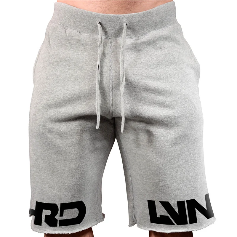 

New Men Cotton Beac Sorts Bottoms yms Fitness Bodybuildin Man Casual Fasion Print Joer Workout sort Pants Sweatpants