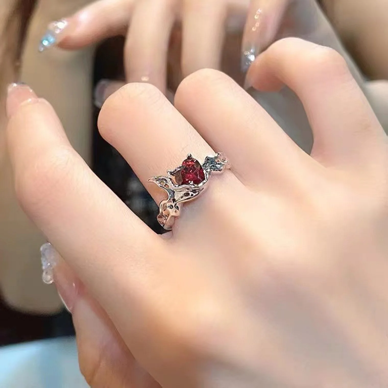 

Lava heart-shaped mythical open ring