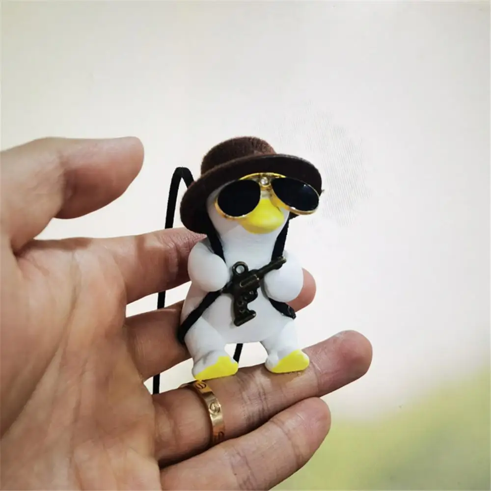 

Super Cool Revolver Swing Duck Cute Gypsum Hot Gypsum Duck Pendants Anime Duck Auto Rearview Mirror Pendant For Car Accessories