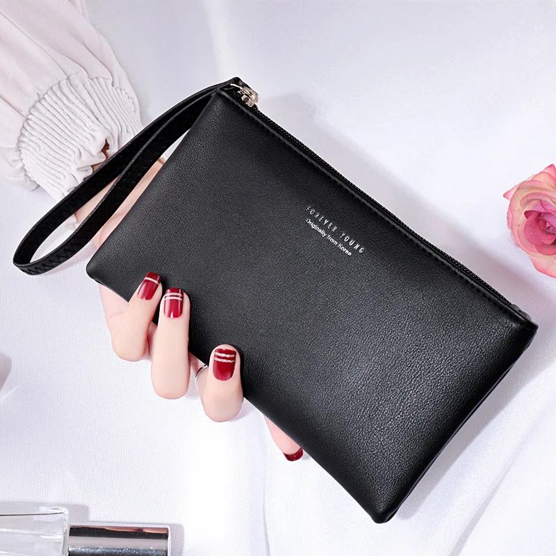 

New mobile phone bag female long zipper coin purse female Korean version of pure color wild card bag mobile phone bag wallet