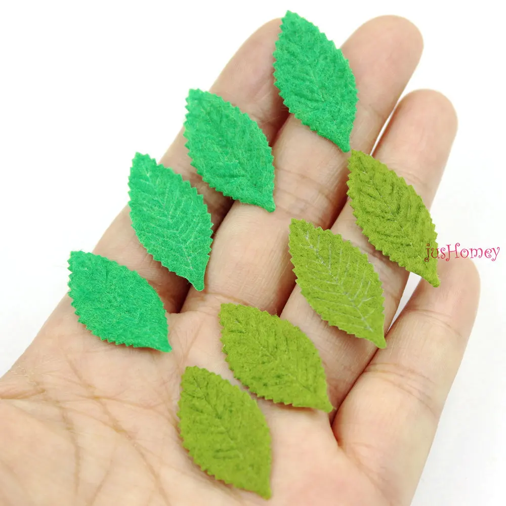 100 шт. войлочные аппликации в виде зеленых листьев 30 х15 мм