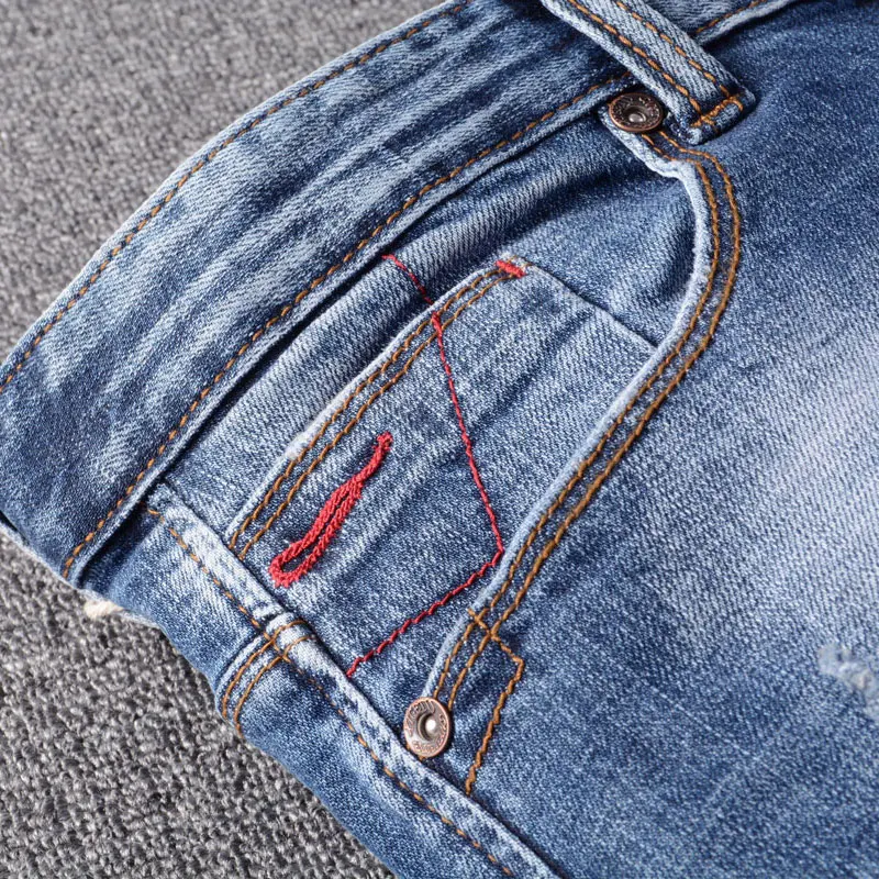 Fashion Designer Men Jeans Retro Blue Slim Fit Stretch Paint Ripped Jeans Men Trousers Patched Vintage Casual Denim Pants Hombre