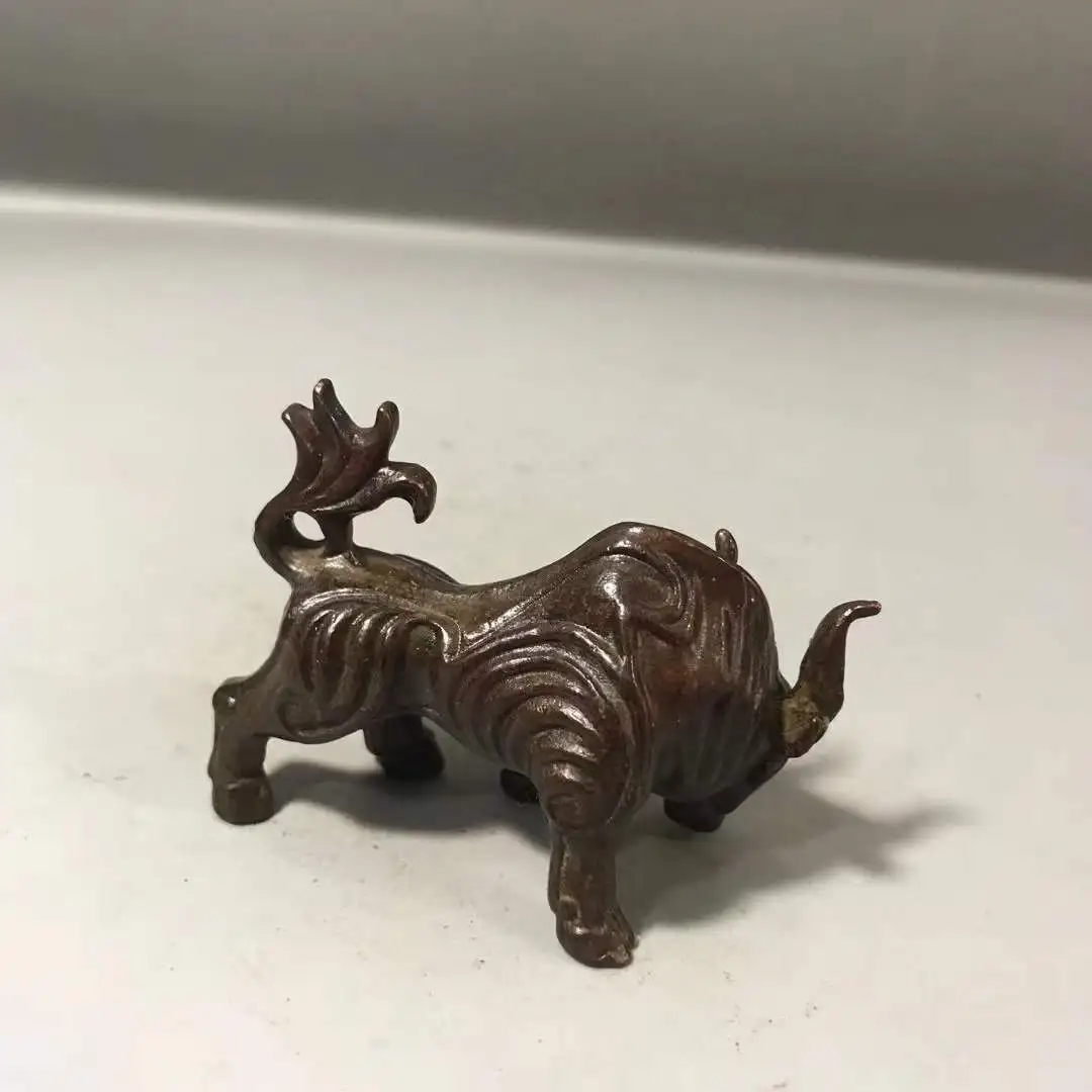 

Бронзовая статуэтка из старой коллекции с покрытием