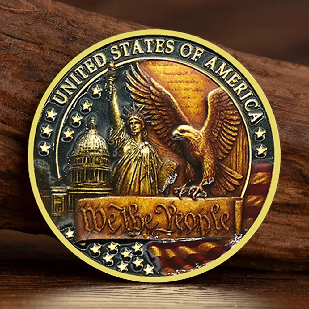 Коллекционная монета «Дух свободы и колокольчик»