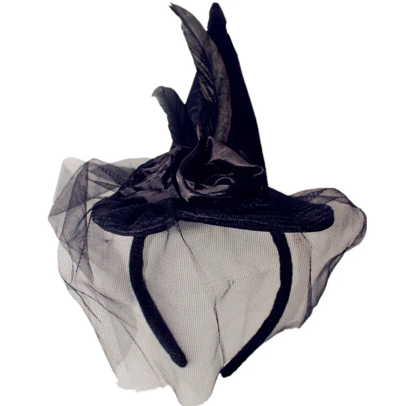 

Фиолетовая ретро шляпа с вуалью и перьями