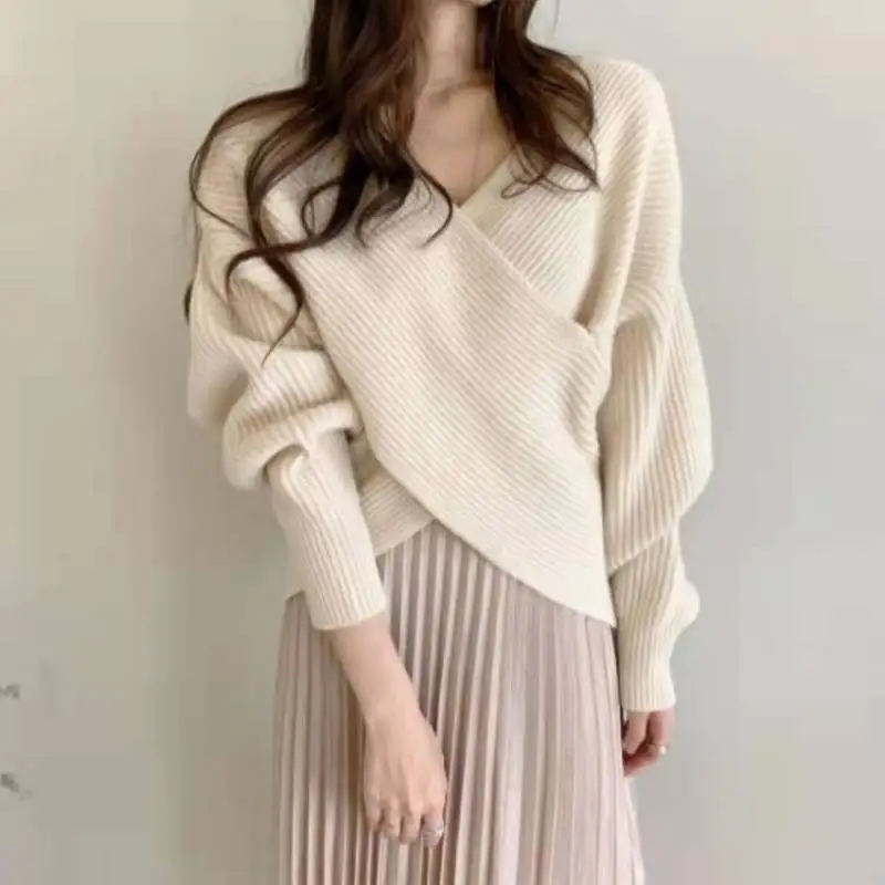 

Cross knit shirt design sense niche temperament simple sweater female 2022 autumn and winter lazy wind loose versatile jacket