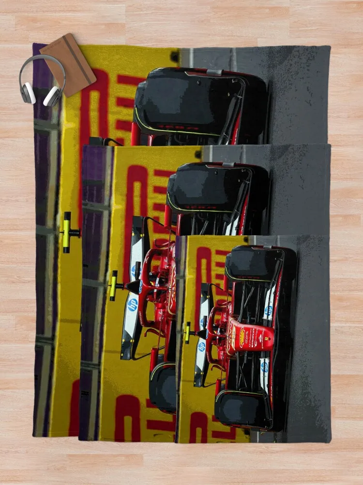 Карлос Саинц гоночный его автомобиль F1 2024 года на улицах Баку во