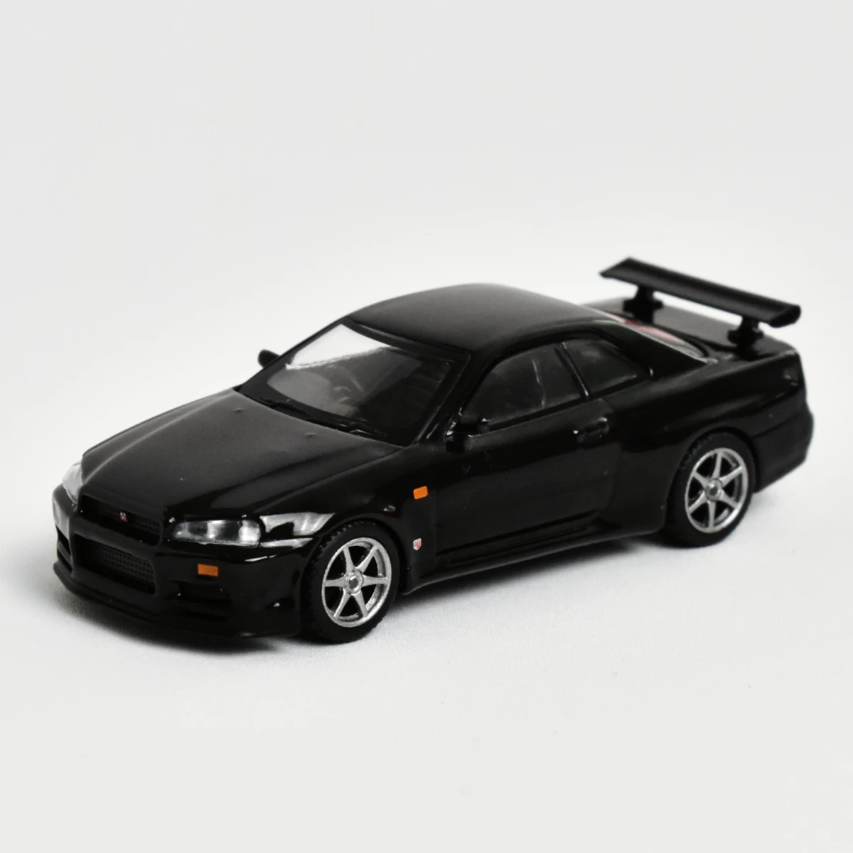 

Модель автомобиля MINI GT 570 1:64 Nissan Skyline GTR (R34)
