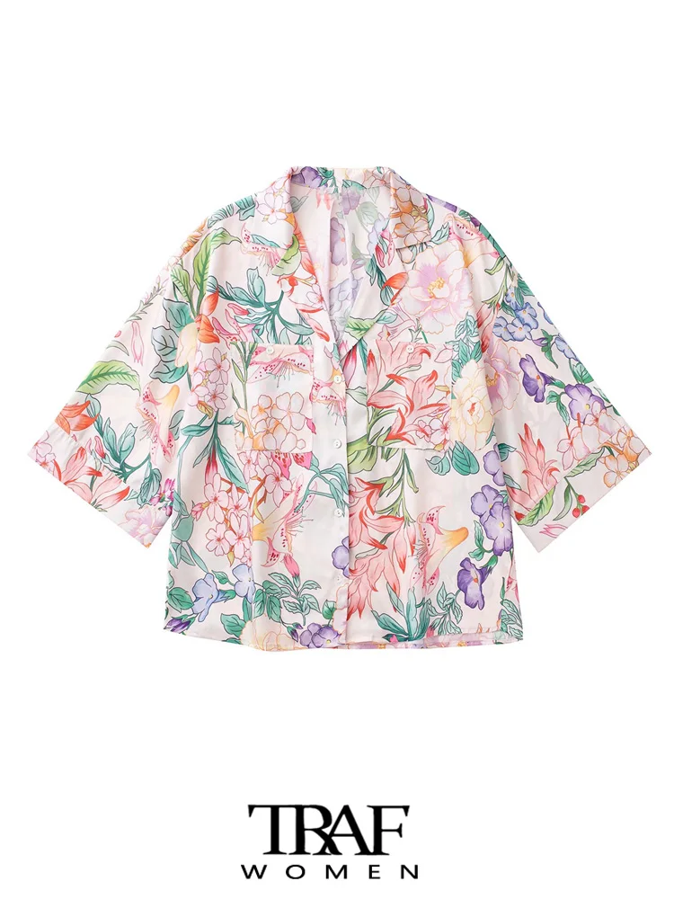 

Блузка женская свободного покроя с рукавом три четверти и цветочным принтом