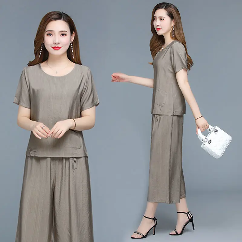 

Женские костюмы из 2 предметов, короткий рукав и брюки с широкими штанинами, модная повседневная одежда, 6XL, J447, на лето