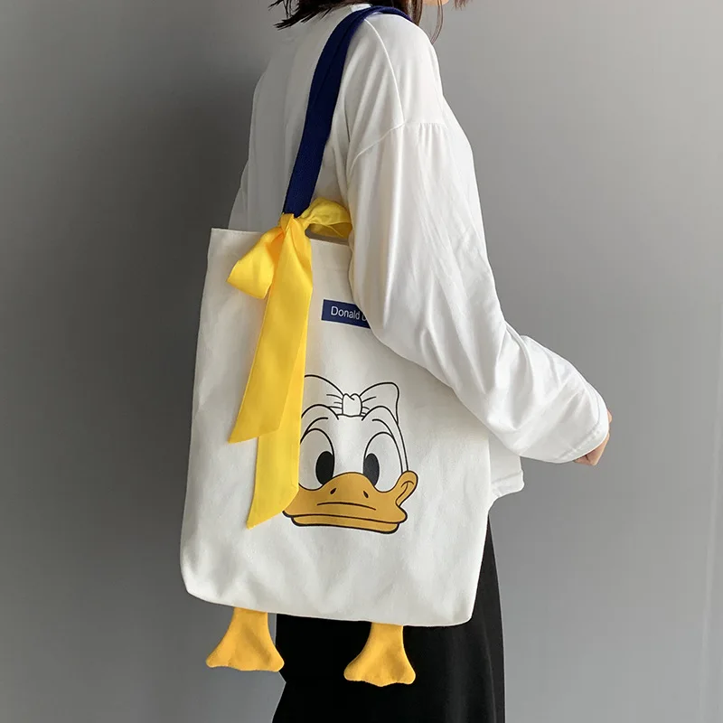 

Casual Handbags Female New Style Fashion Trendy Donald Duck Cute Students High Capacity Canvas Simple All-match One Shoulder Bag