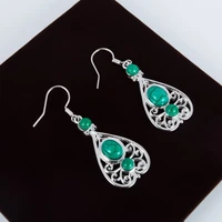 milangirl women earing retro simple hollowed carved ethnic style earrings of turquoises features texture stone earrings