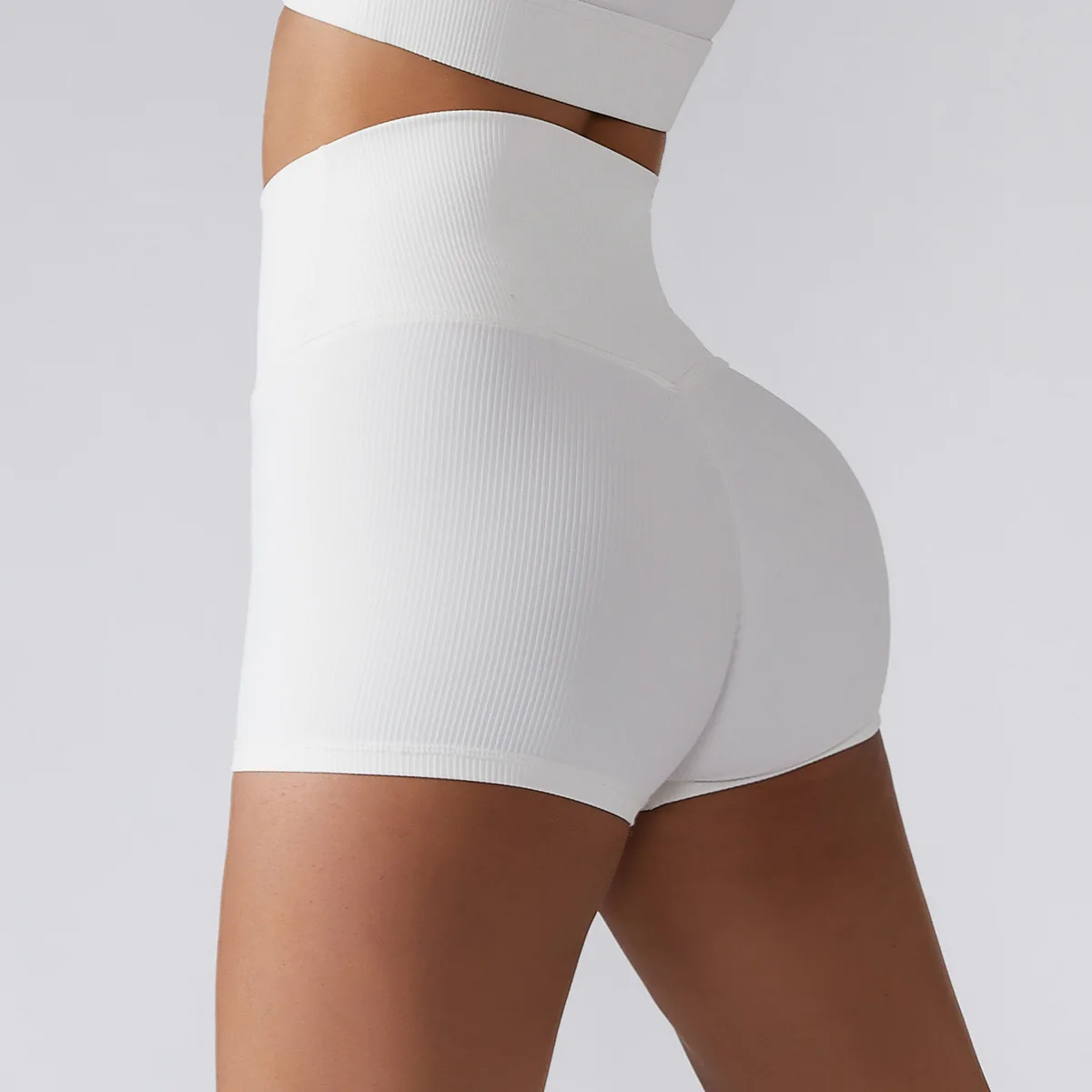 

2022 spring new pure white abdominal sports fitness shorts buttocks nude yoga pants women's high waist lift tight shorts