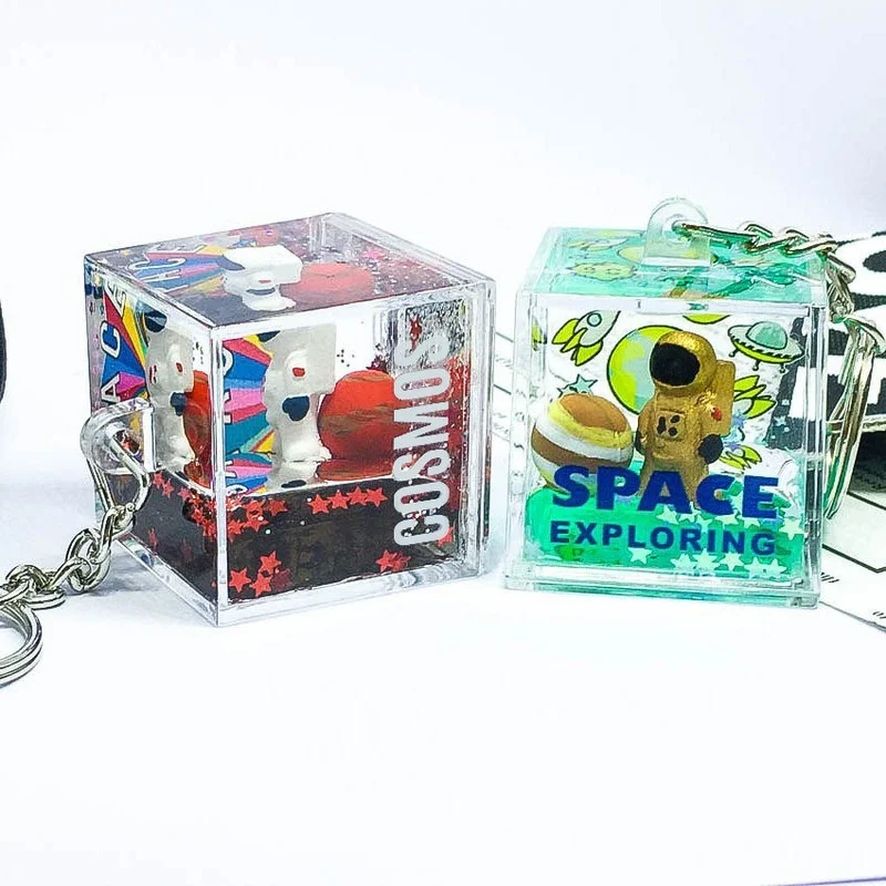 

Star Keychain Ornament Astronaut Floating Spaceman Creative Globe Moving Liquid Quicksand Planet Keyring Pendant Keyfob Gift