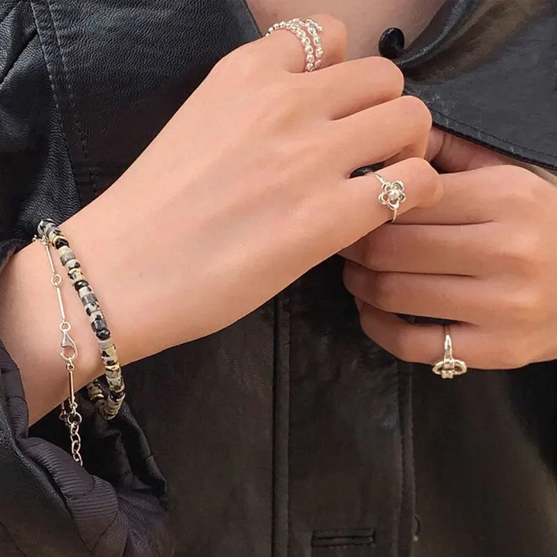 Женское кольцо с искусственным жемчугом серебристое регулируемое цветком