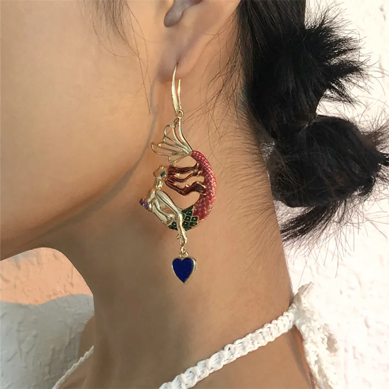 

Fashion Personality Resort Sea Wind Earrings Creative Drip Exaggerated Mermaid Earrings Ms Birthday, Tourist Commemorative Gifts