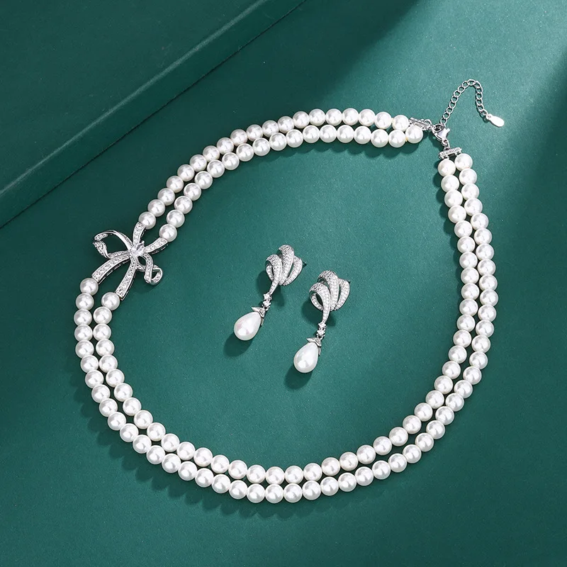 

Temperament Women's White Freshwater Pearls Jewelry Set S925 Silver Elegant Bowknot Dating Anniversary Pendant Necklace Earring
